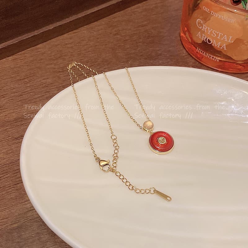 ゴールドアクセサリー レディース 上品な円形宝石ネックレス