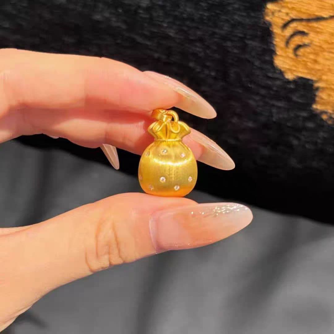 ゴールドアクセサリー レディース 小粒宝石付き巾着ネックレス